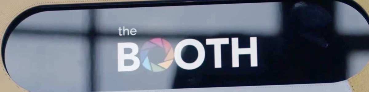The billboard screen on a Booth Mini showing The Booth logo