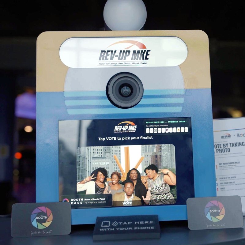 The Booth in Rev-Up MKE gold and blue